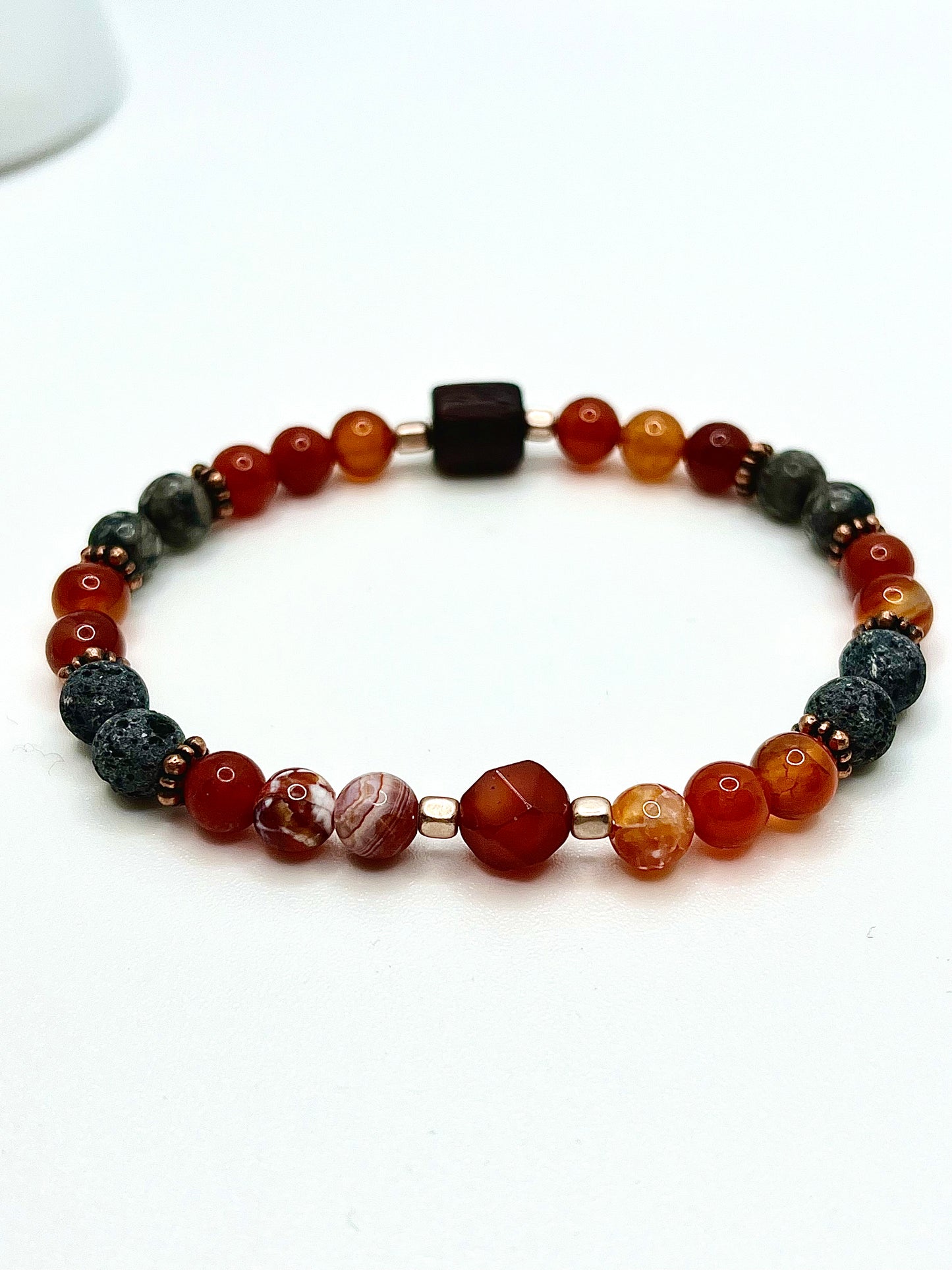 Single bracelet with red orange, grey beads